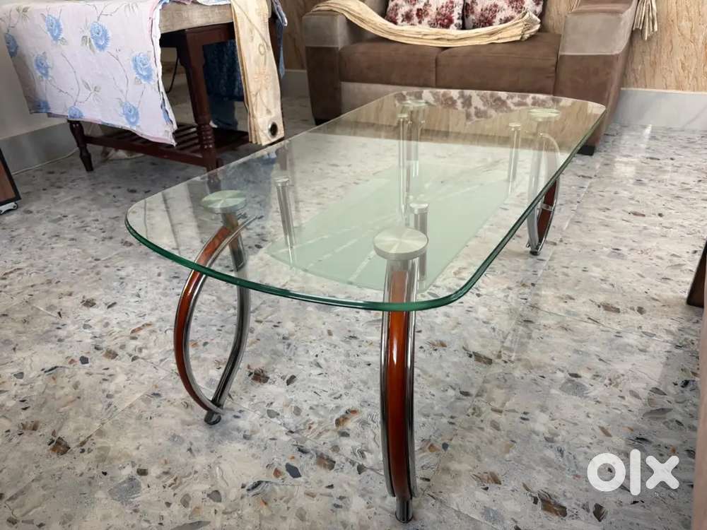 Glass top centre table