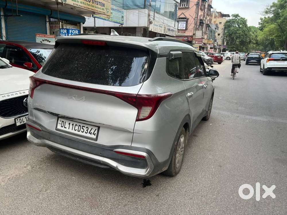 Kia Carens G 1.5 6mt Premium (o) 7-seater, 2022, Cng & Hybrids
