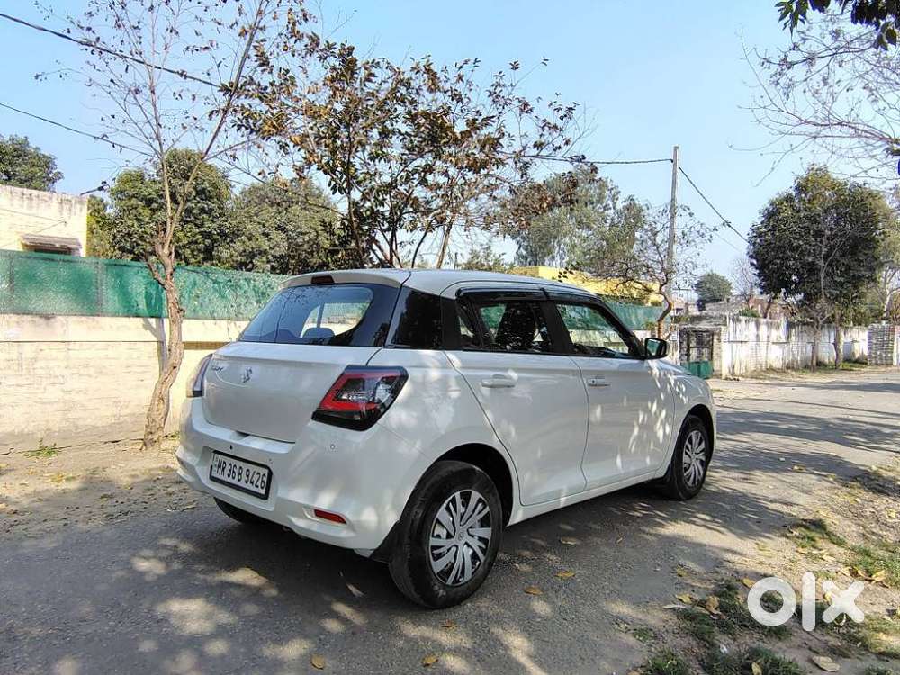 Maruti Suzuki Swift Lxi Optional-o, 2024, Petrol