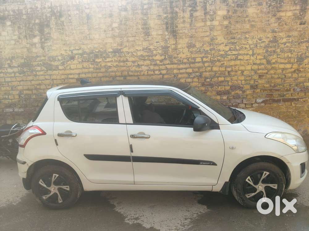 Swift Lxi 2015 Km Driven