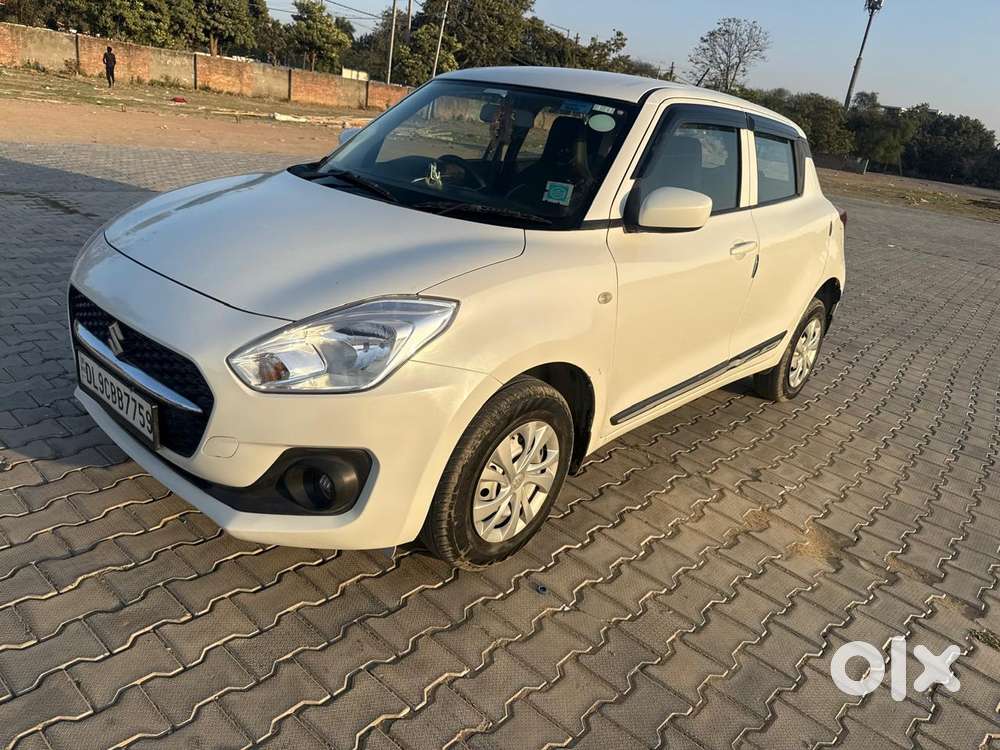 Maruti Suzuki Swift 1.2 Lxi (o), 2023, Petrol