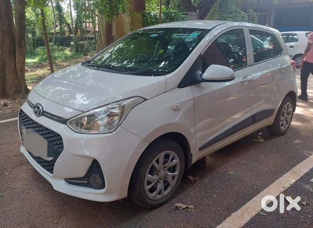 Hyundai Grand I10 2017 Petrol 47000 Km White Colour Single Owner