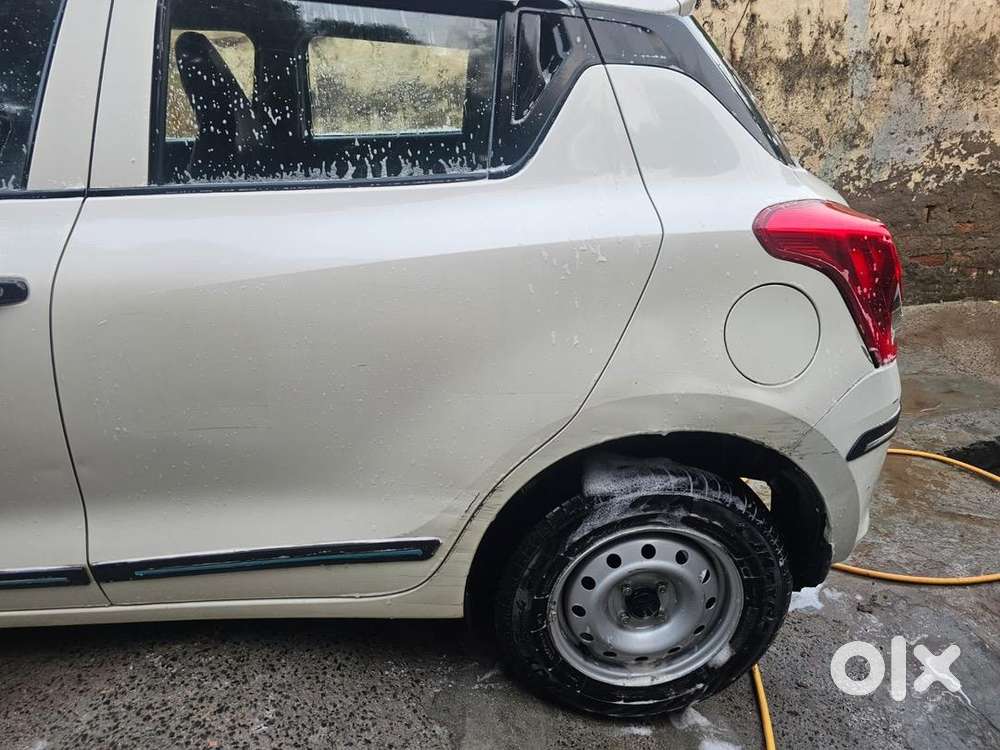 Swift , 2022, Petrol , White Color , 23200km Driven ,
