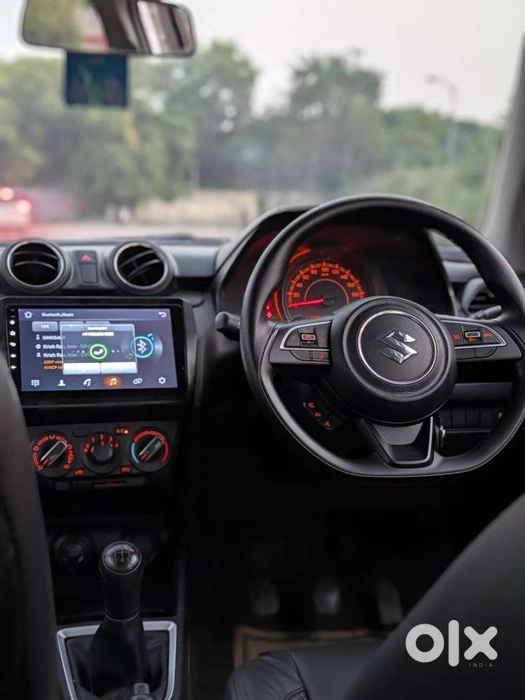 Maruti Suzuki Swift 1.2 Lxi (o), 2023, Petrol