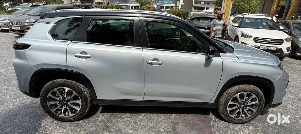 Maruti Suzuki Grand Vitara 1.5 Zeta Plus Dual Tone Intelligent Hybri..