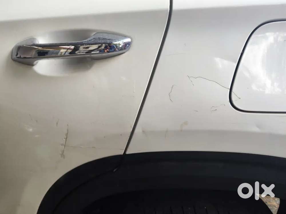 Minor Scratches Only On Right Door