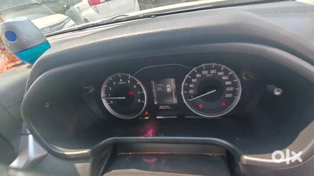 Maruti Brezza Vxi 2024