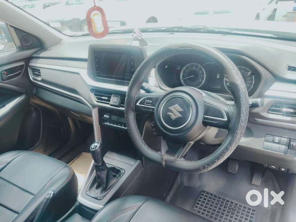 Maruti Suzuki Brezza Vxi 2024