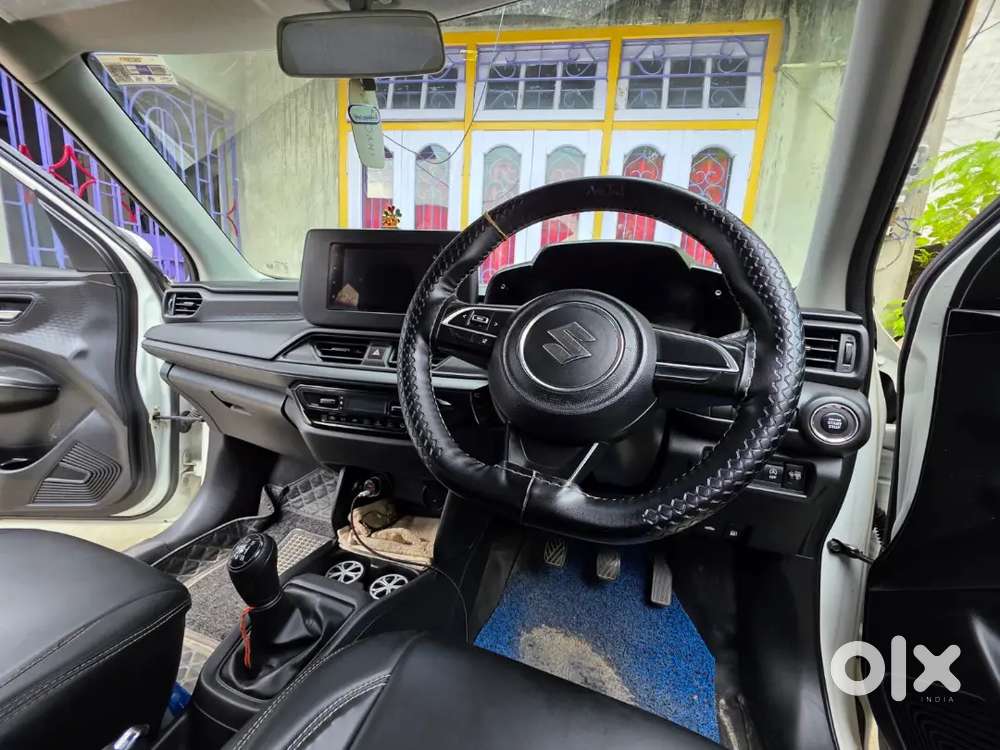 Maruti Suzuki Swift Vxi Optional  2024