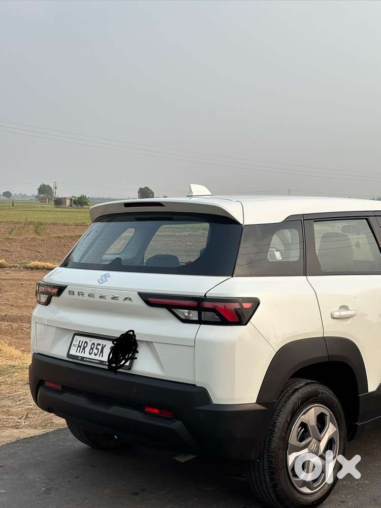 Maruti Suzuki Brezza Vxi December 2025