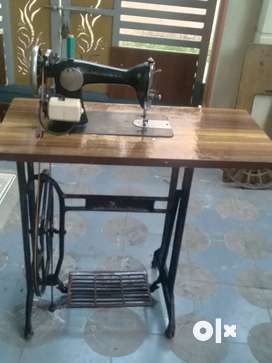 Tailoring machine with table price deals olx