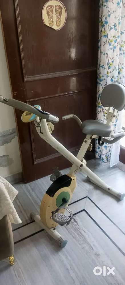 Gym cycle with tension controller