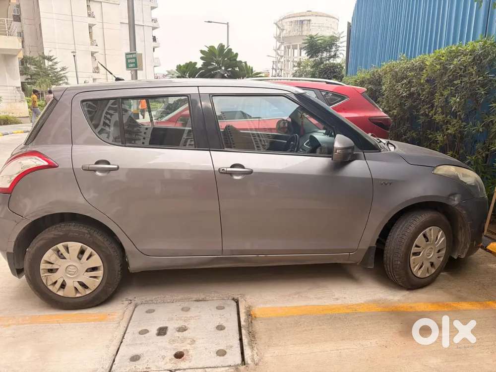 Maruti Suzuki Swift Vxi 2014.