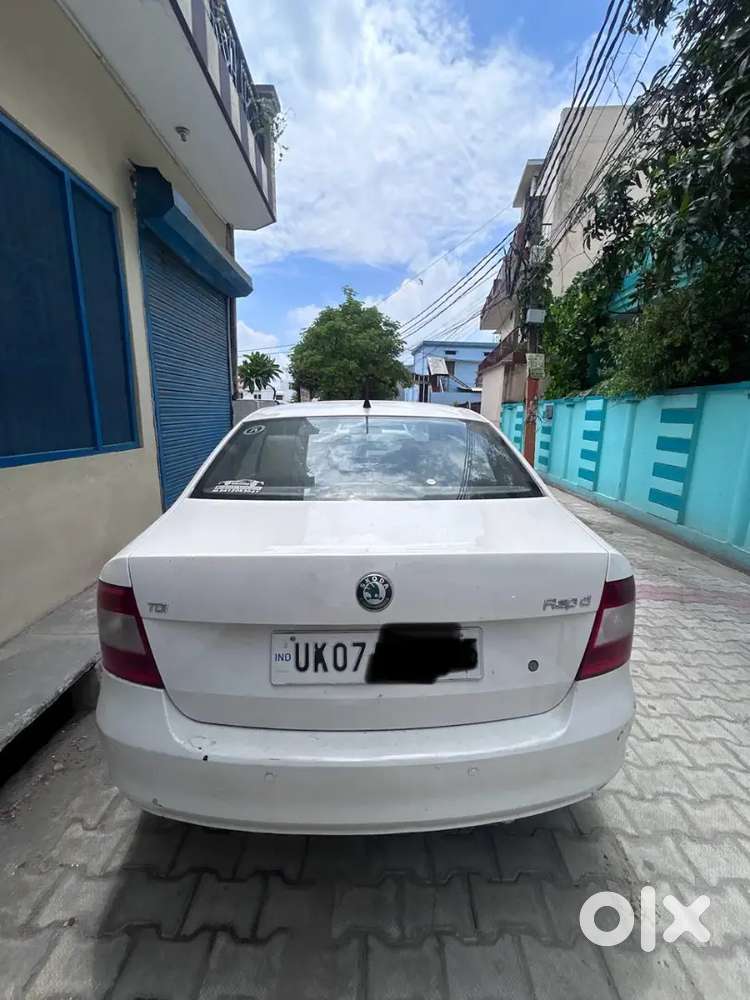 Skoda Rapid Elegance 2013 Diesel White