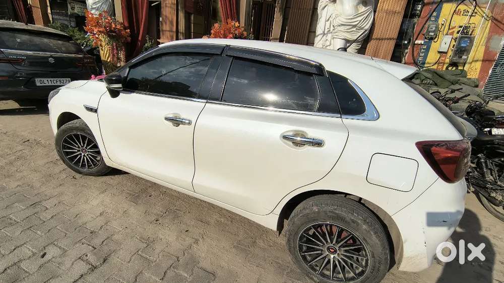 Baleno 2023 Petrol 1st Owner White Alloy Wheels Led Light Music System