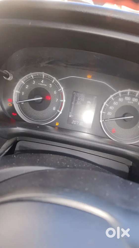 Maruti Suzuki Brezza Vxi 2025
