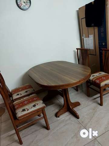 Dining table with four chairs a study table and a Dressing Table