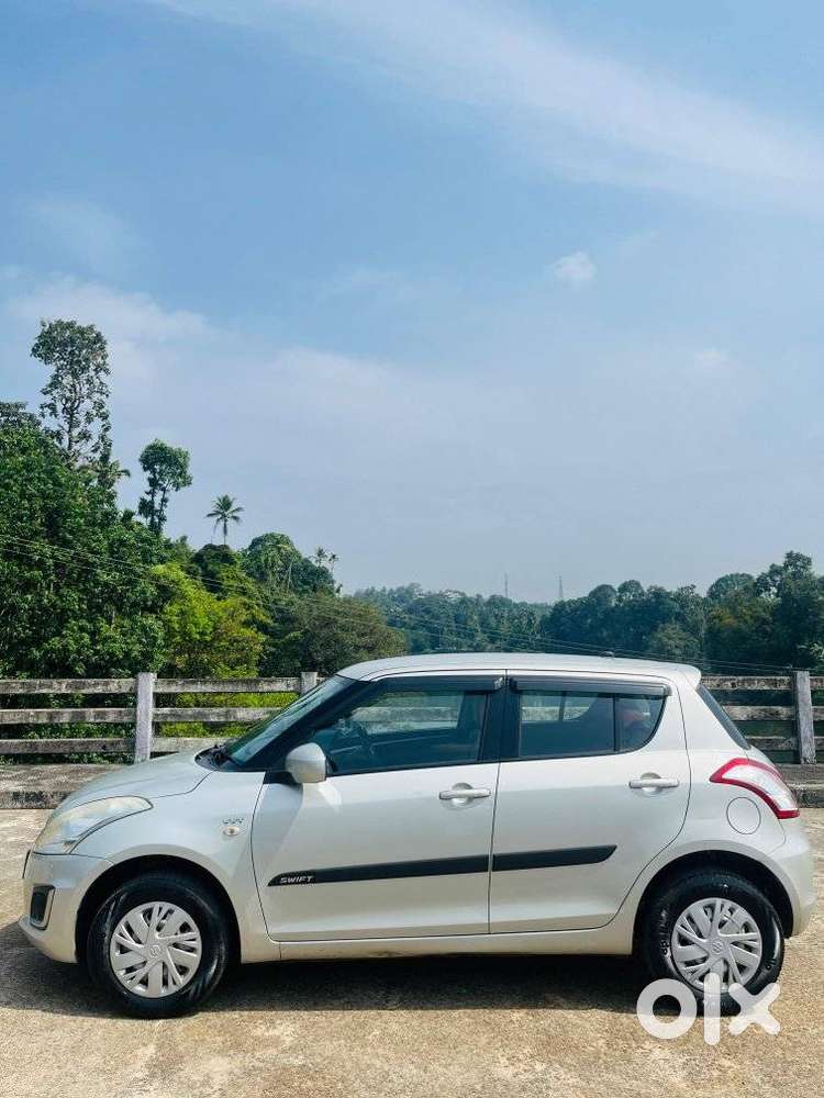 Maruti Suzuki Swift Lxi Optional-o, 2016, Petrol