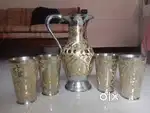 Old antique handicrafted jug set.