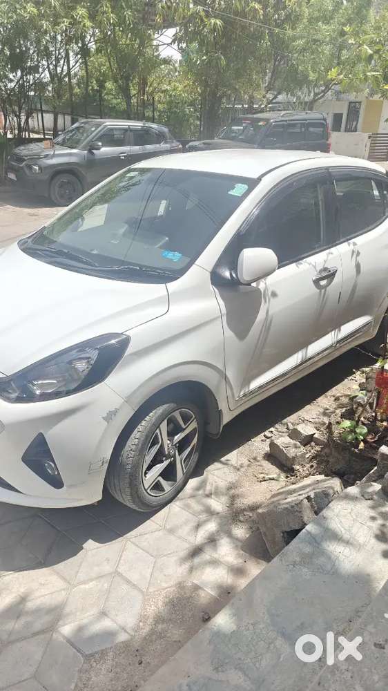 Hyundai Aura 2022 Petrol 41000 Km  Services Centre ,armrest,sunshades