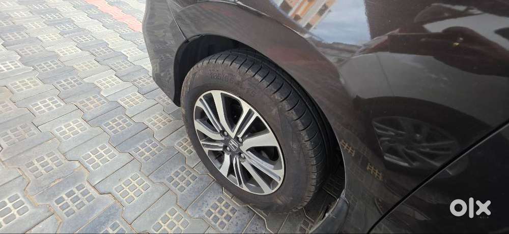 Honda New City V (petrol + Cng) Golden Brown