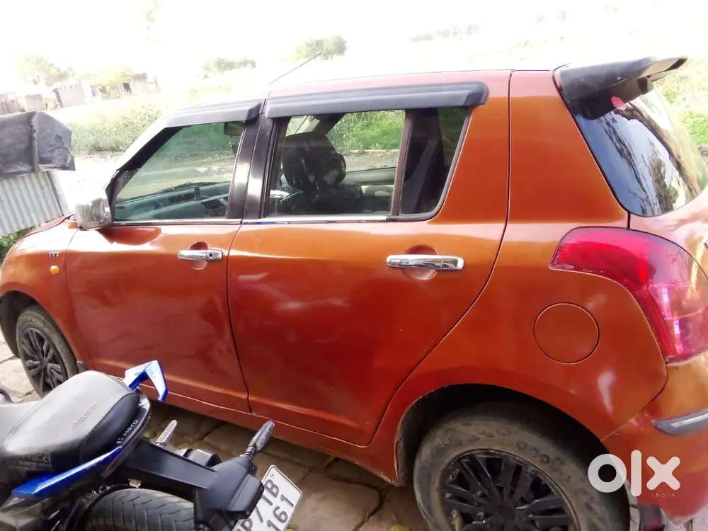 Maruti Suzuki Swift Vxi