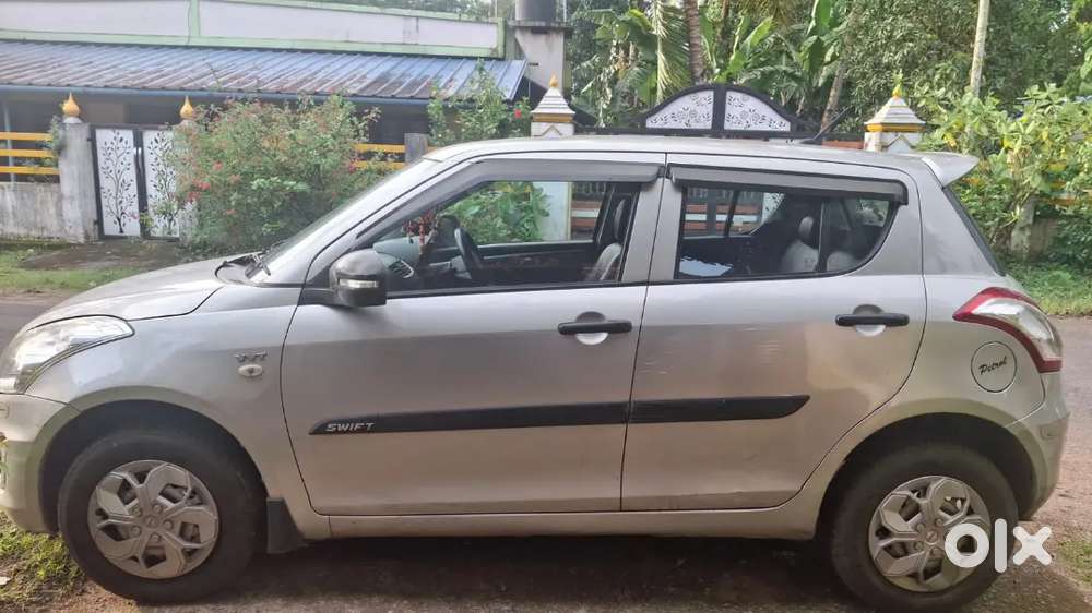 Maruti Suzuki Swift Lxi 2015
