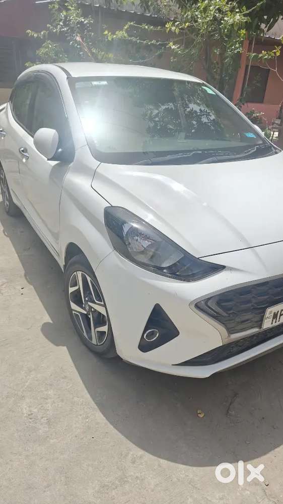 Hyundai Aura 2022 Petrol 41000 Km  Services Centre ,armrest,sunshades