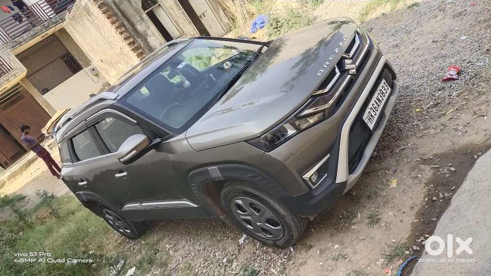 Maruti Suzuki New Brezza 2023. My Car Insurance Feb. 2027.
