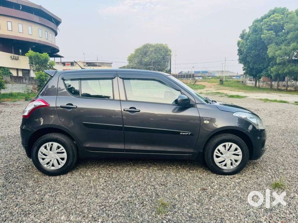Maruti Suzuki Swift Lxi Optional-o, 2017, Petrol