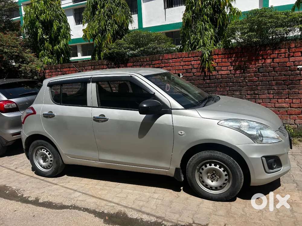 “swift Lxi 2015 – Brand New Feel, Driven With Care!”