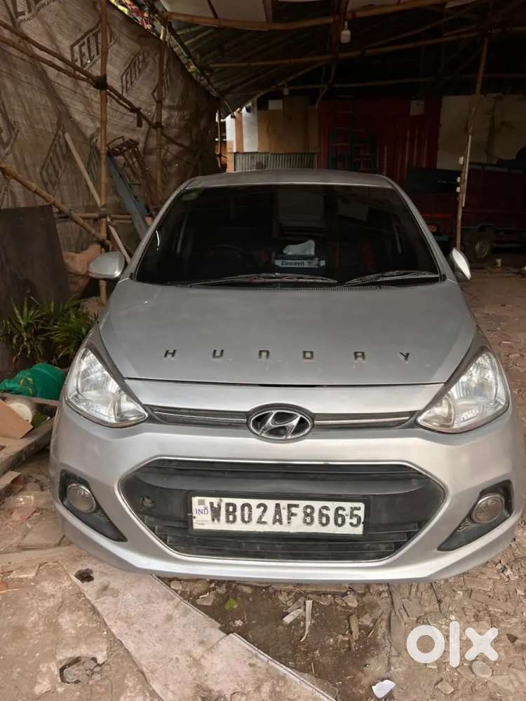 Hyundai Xcent 2014 Tax 2029