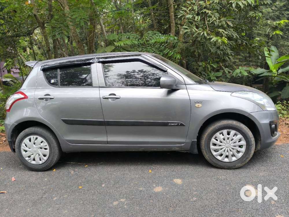 Maruti Suzuki Swift Lxi Optional-o, 2015, Petrol
