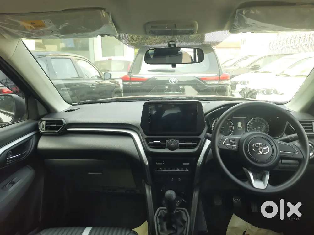 Toyota New Hyryder With Scooty Free In It.