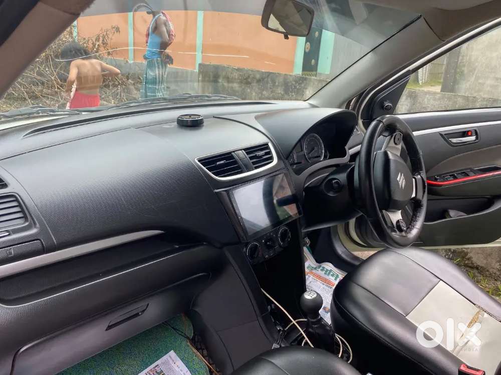 Maruti Suzuki Swift Lxi 2014