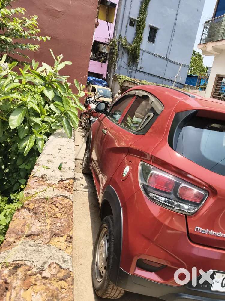 Well-maintained 2018 Mahindra Kuv100 K2 (red)