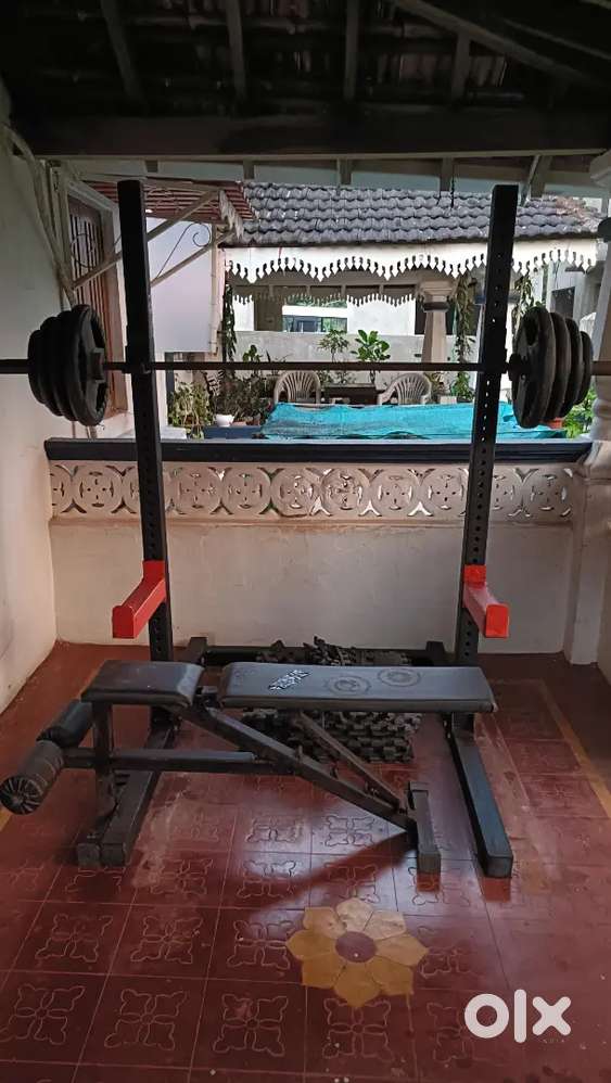 Home gym Bench, bar with weights rack in good