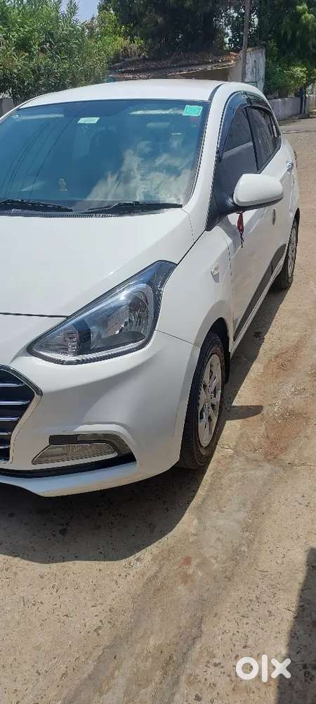 Hyundai Xcent Cng + Petrol  40,000 Km  32 Km/kg Mileage  Excellent