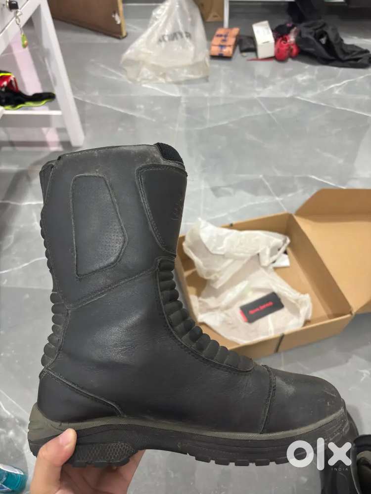 Riding boot and helmet