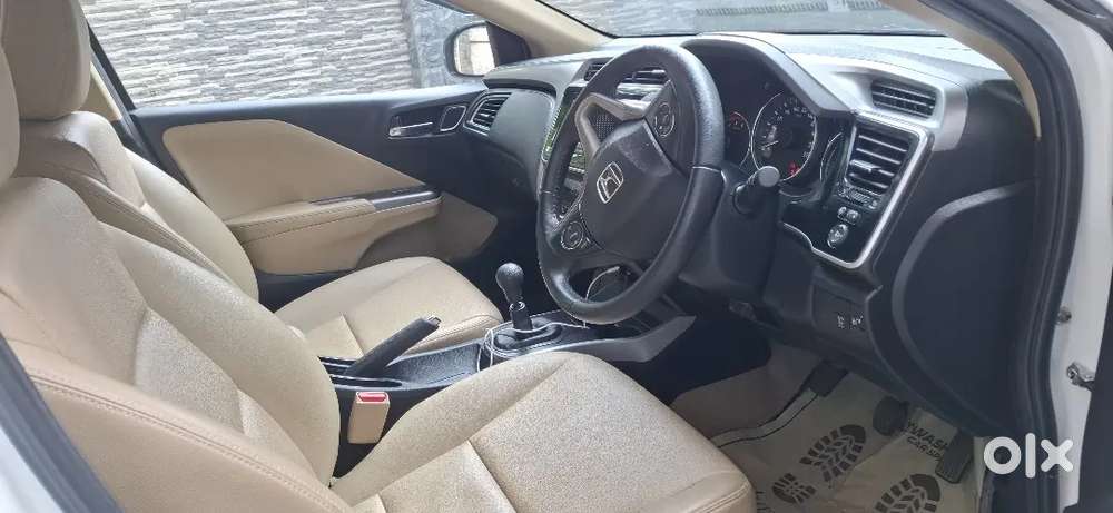 Low Km, Well Maintained And Sunroof Car
