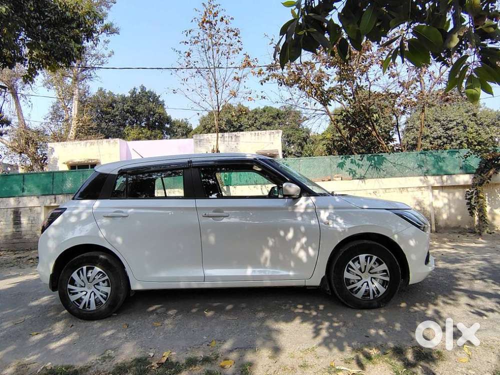 Maruti Suzuki Swift Lxi Optional-o, 2024, Petrol