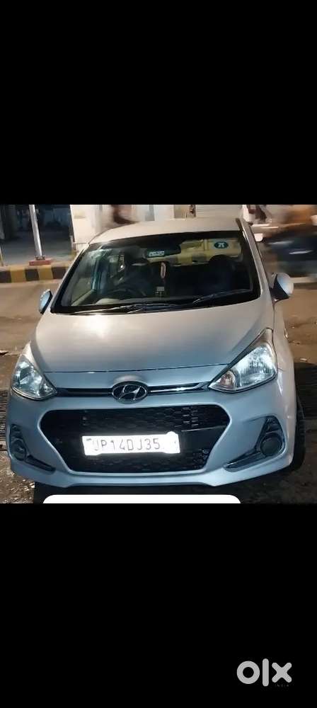 Hyundai Grand I10 2017 Petrol 51000 Km Driven.silver Colour..