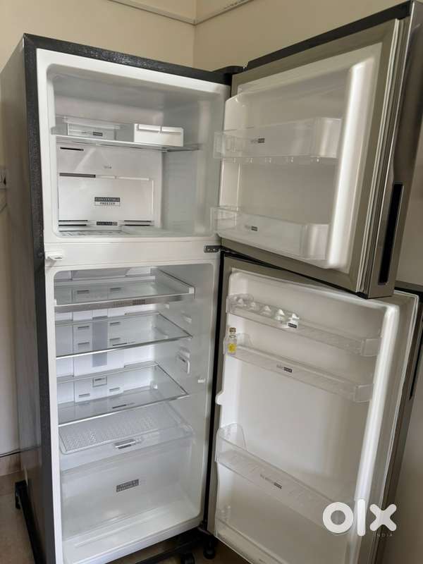 Whirlpool fridge 308 litre double door 2 years old