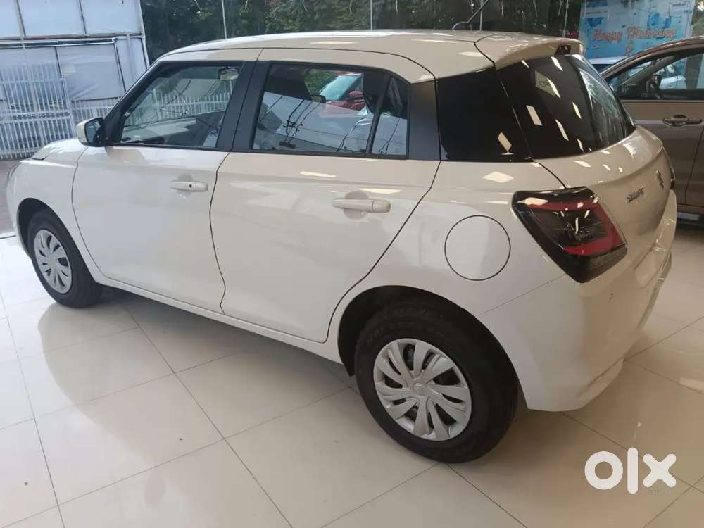 Maruti Suzuki Swift Vxi 2026