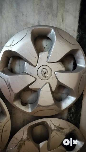 Tata tiago deals wheel cap original