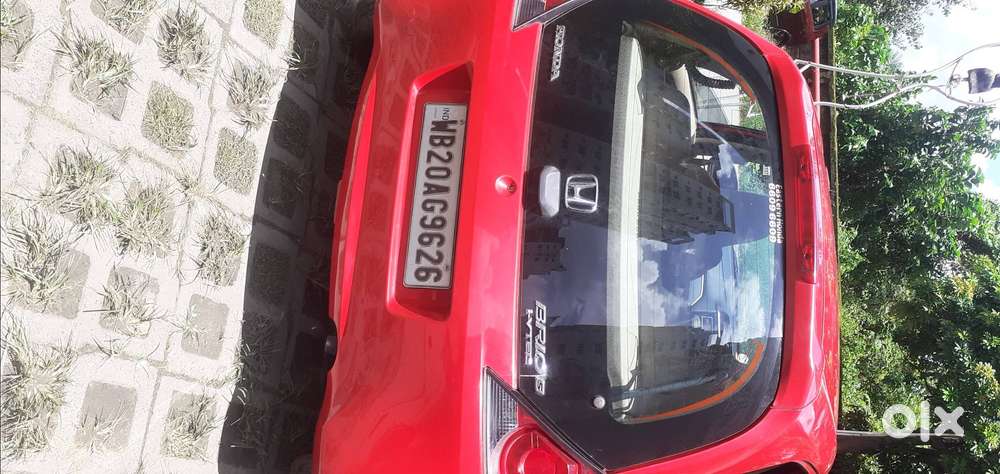 Honda Brio . Vx Mt . 9 Yrs . 12000 Km Driven.