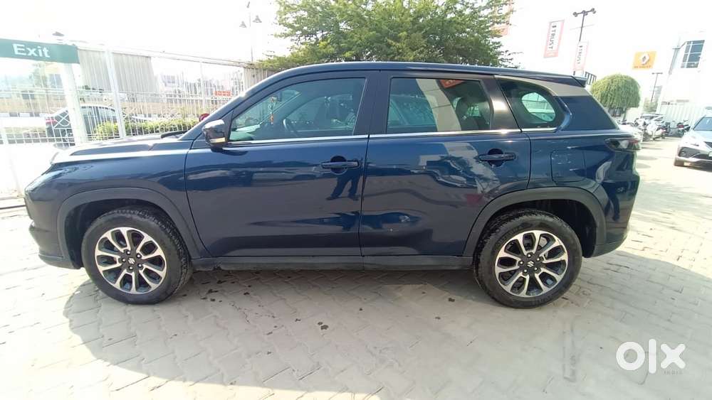 Maruti Suzuki Grand Vitara 1.5 Zeta Plus Dual Tone Intelligent Hybri..