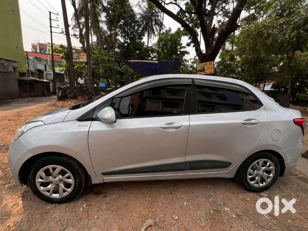 Hyundai Xcent 2014 Tax 2029