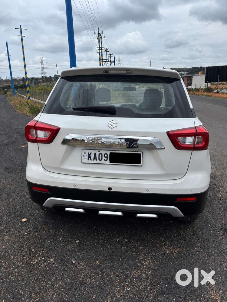 2021 Vitara Brezza Zxi (white)  1st Owner  38k Km  Mint