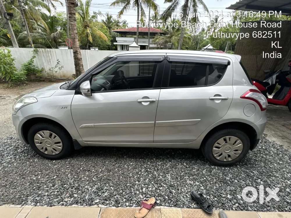 Maruti Suzuki Swift Lxi 2014